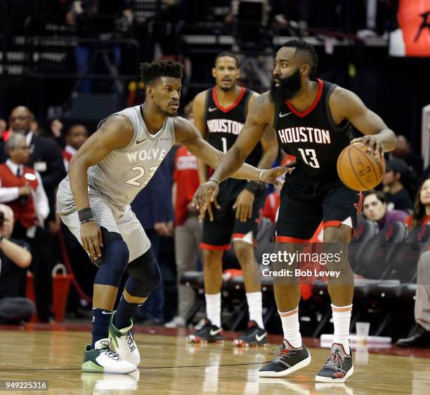 James Harden of the Houston Rockets is defended by Jimmy Butler of the Minnesota Timberwolves during Game Two of the first round of the Western...