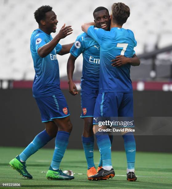 Eddie Nketiah celebrates scoring Arsenal's 2nd goal with Vlad Dragomir and Tolaji Bola during the match between West Ham United and Arsenal at London...