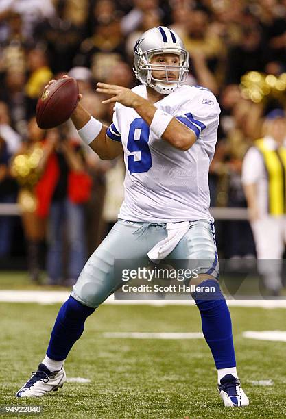 Quarterback Tony Romo of the Dallas Cowboys attempts a pass against the New Orleans Saints at the Louisiana Superdome on December 19, 2009 in New...