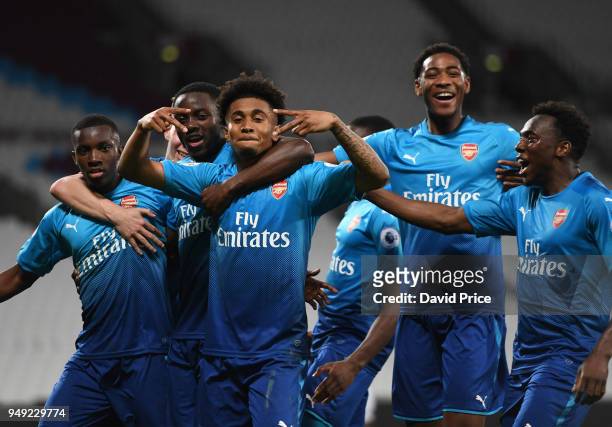 Eddie Nketiah celebrates scoring Arsenal's 3rd goal with Josh Dasilva, Reiss Nelson, Zech Medley and Tolaji Bola during the match between West Ham...