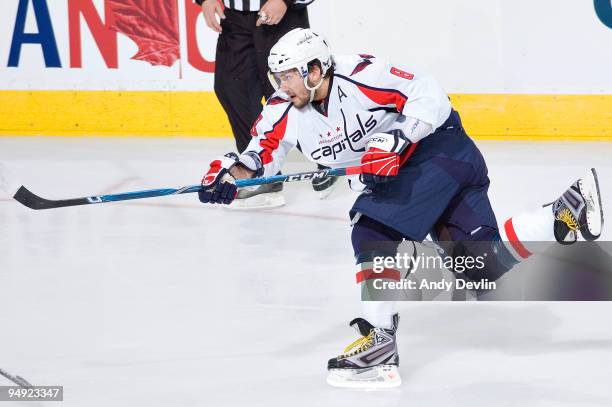 Alex Ovechkin of the Washington Capitals follows through on a wrist shot against the Edmonton Oilers at Rexall Place on December 19, 2009 in...
