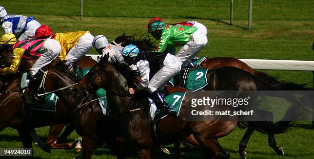 moving to the front - jockey silks stock pictures, royalty-free photos & images