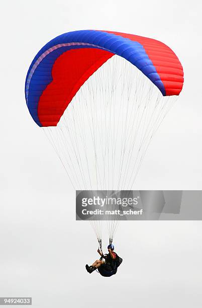 isolated paraglider - paragliding stockfoto's en -beelden