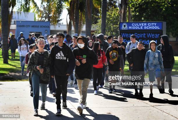 Students from the Culver City Middle School participate in a walkout demonstration as part of the National School Walkout for Gun Violence Prevention...