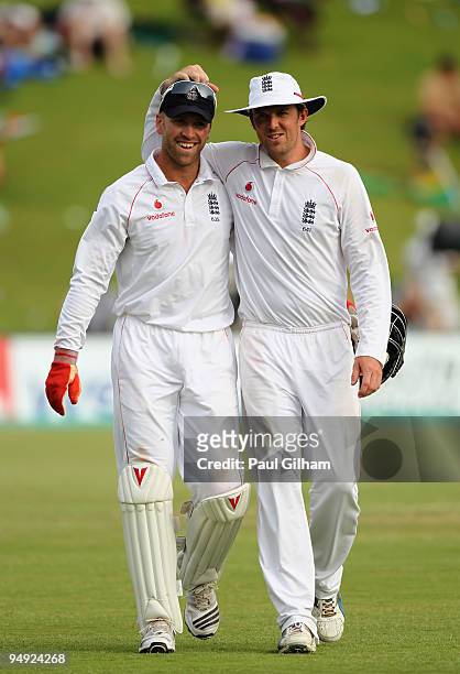 Graeme Swann of England looks on with team-mate Matt Prior of England during day four of the first test match between South Africa and England at...