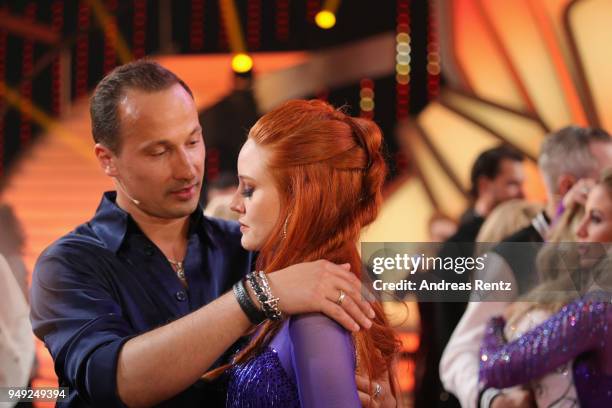 Barbara Meier and Sergui Luca look dejected during the 5th show of the 11th season of the television competition 'Let's Dance' on April 20, 2018 in...