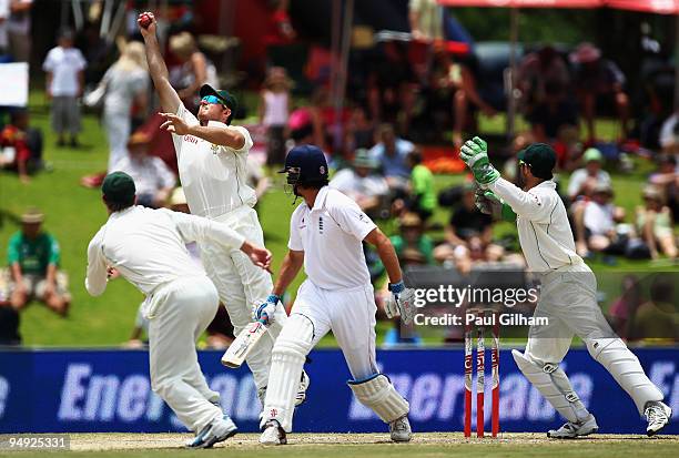 Graeme Smith of South Africa catches out Alastair Cook of England off the bowling of Paul Harris of South Africa for 12 runs during day five of the...