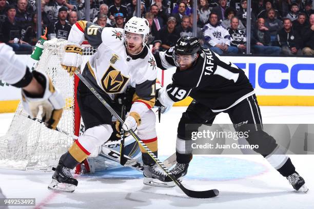 Jon Merrill of the Vegas Golden Knights battles in front of the net against Alex Iafallo of the Los Angeles Kings in Game Four of the Western...