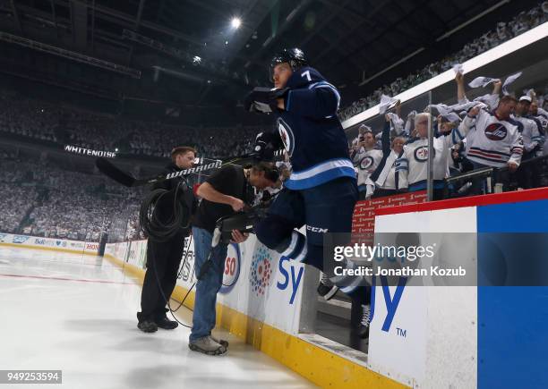 Ben Chiarot of the Winnipeg Jets hits the ice prior to puck drop against the Minnesota Wild in Game Five of the Western Conference First Round during...