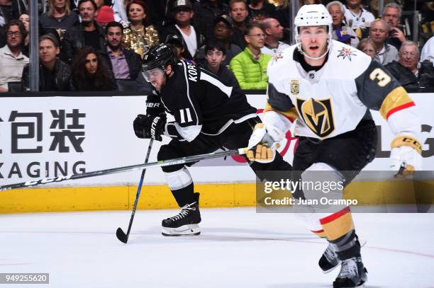 Anze Kopitar of the Los Angeles Kings and Brayden McNabb of the Vegas Golden Knights skate in Game Four of the Western Conference First Round during...