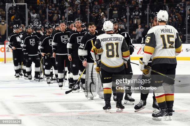 The Los Angeles Kings line up to shake hands with the Vegas Golden Knights following Game Four of the Western Conference First Round during the 2018...