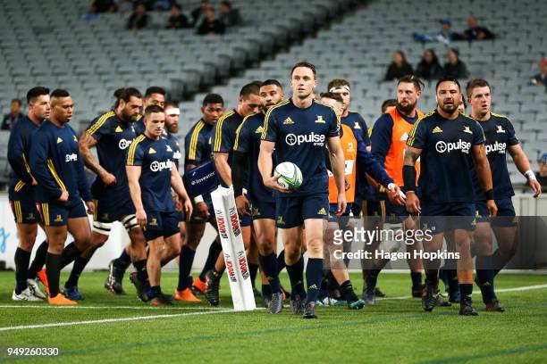 Ben Smith of the Highlanders leads his team off the field after warming up during the round 10 Super Rugby match between the Blues and the...