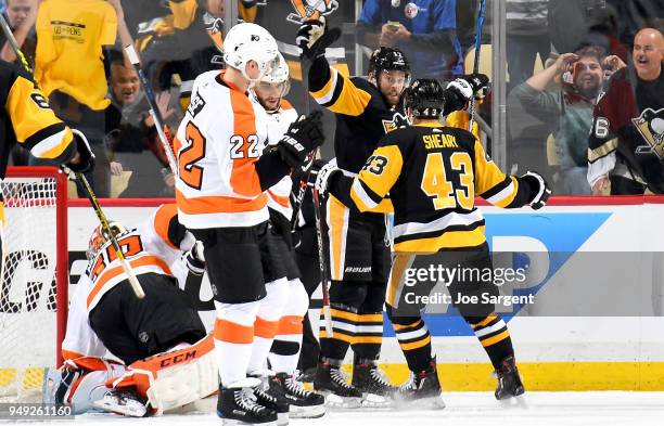 Bryan Rust of the Pittsburgh Penguins celebrates his second period goal against the Philadelphia Flyers in Game Five of the Eastern Conference First...