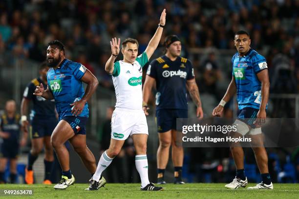 Referee Marius van der Westhuizen makes a call during the round 10 Super Rugby match between the Blues and the Highlanders at Eden Park on April 20,...