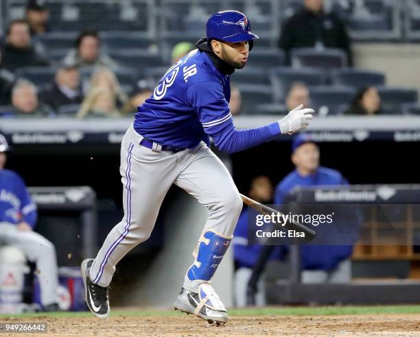 Lourdes Gurriel Jr. #13 of the Toronto Blue Jays hits an RBI single in the fifth inning against the New York Yankees at Yankee Stadium on April 20,...