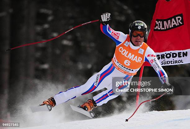 France's Johan Clarey competes to finish third of the men's World Cup downhill race in Val Gardena on December 19, 2009. Canada's Manuel...