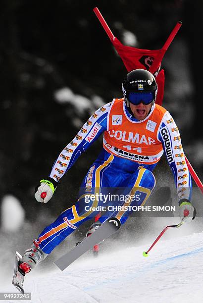 Sweden Hans Olsson competes to finish seventh of the men's World Cup downhill race in Val Gardena on December 19, 2009. Canada's Manuel...