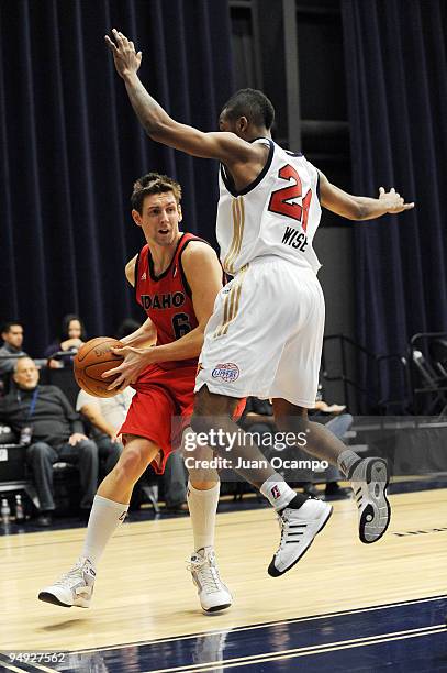 Mike Gansey of the Idaho Stampede looks to make a pass while being defended by Jeremy Wise of the Bakersfield Jam during a D-League game on December...