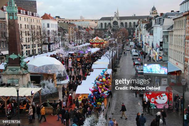 belgium, brussels, city skyline and christmas market on the fish-market-place in the old town - brussels skyline stock pictures, royalty-free photos & images