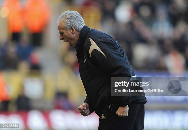 Mick McCarthy of Wolves celebrates the second goal during the Barclays Premier League match between Wolverhampton Wanderers and Burnley at Molineux...