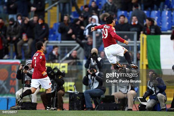 Nicolas Burdisso celebrates with David Pizarro of AS Roma after scoring the opening goal during the Serie A match between Roma and Parma at Stadio...