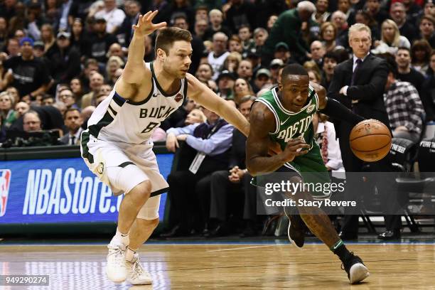 Terry Rozier of the Boston Celtics is defended by Matthew Dellavedova of the Milwaukee Bucks during the first half of game three of round one of the...