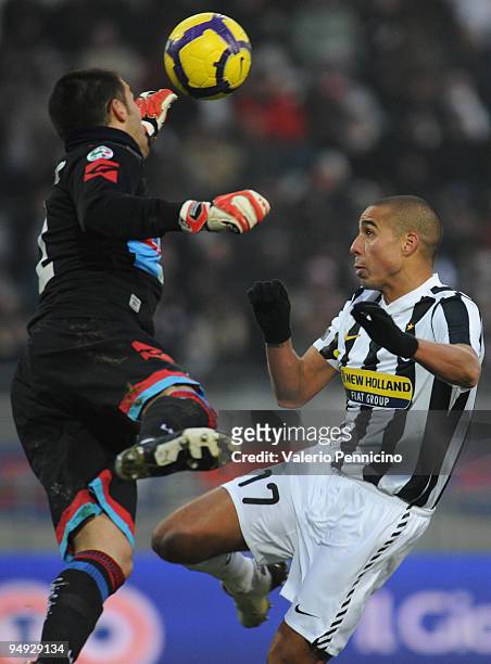 Goalkeeper Mariano Andujar of Catania Calcio in action against David Trezeguet of Juventus during the Serie A match between Juventus FC and Catania...
