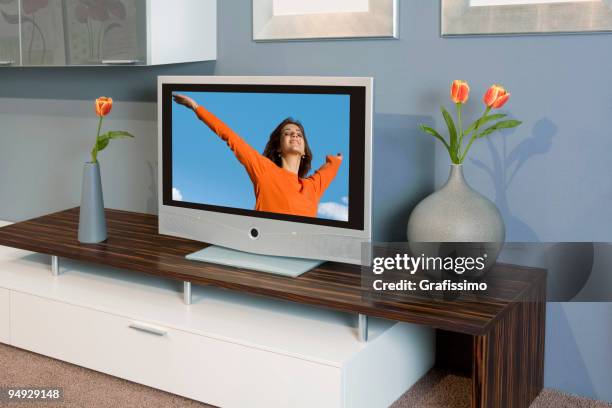 apartment with plasma television - flat screen stock pictures, royalty-free photos & images