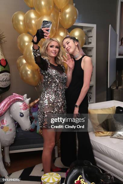 Paris Hilton and Irene Kim attend the Paris Hilton X Beautycon Festival NYC Pre-Party on April 20, 2018 in New York City.