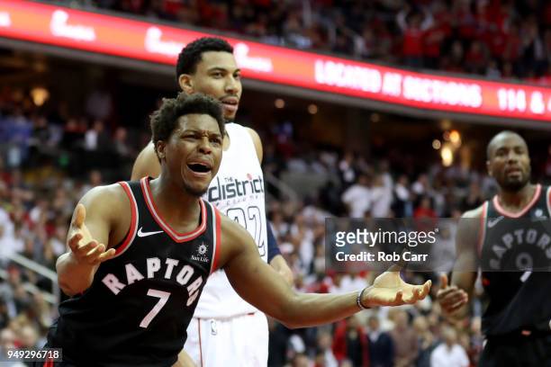Kyle Lowry of the Toronto Raptors reacts to an officials call in the second half against the Washington Wizards during Game Three of Round One of the...