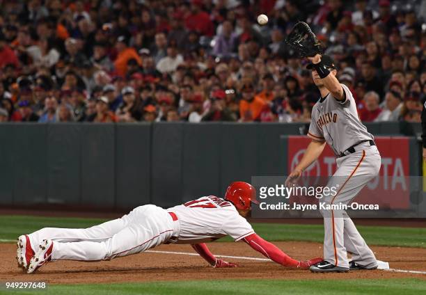 Shohei Ohtani of the Los Angeles Angels of Anaheim beats the throw back to Buster Posey of the San Francisco Giants in the second inning of the game...