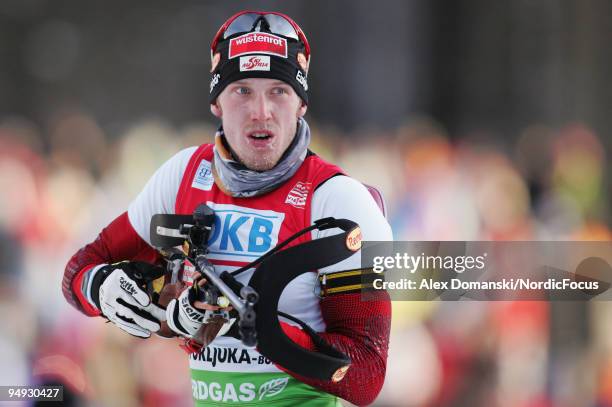 Dominik Landertinger of Austria competes during the Men's 10km Pursuit in the e.on Ruhrgas IBU Biathlon World Cup on December 20, 2009 in Pokljuka,...