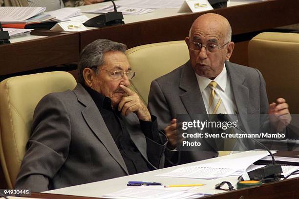 Raul Castro , President of Cuba and brother of Revolution leader Fidel Castro, listens to Cuba�s first Vice-President Jose Ramon Machado Ventura...