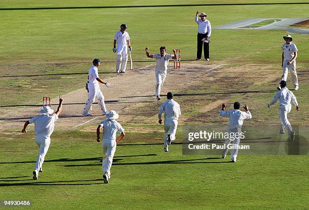 Friedel de Wet of South Africa celebrates with his team-mates after taking the wicket of Matt Prior of England for no runs during day five of the...