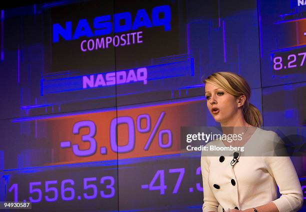 Television anchor reports from the Nasdaq Market Site in New York, U.S., on Friday, Oct. 24, 2008. U.S. Stocks dropped, capping a five-week slide...