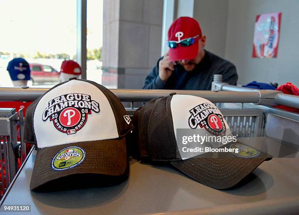 Philadelphia Phillies League Champions hats sit on display in a gift shop at Citizens Bank Park, home of the Phillies, in Philadelphia, Pennsylvania,...