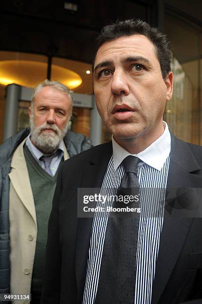 Bernard Benaiem, right, and Eric Dupond-Moretti, lawyers for former Societe Generale trader Jerome Kerviel, speak to journalists at a courthouse in...