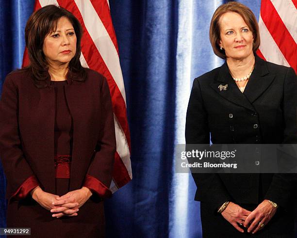 Representative Hilda Solis of California, left, and Karen Mills, a founding partner of New York-based equity firm Solera Capital, listen to U.S....