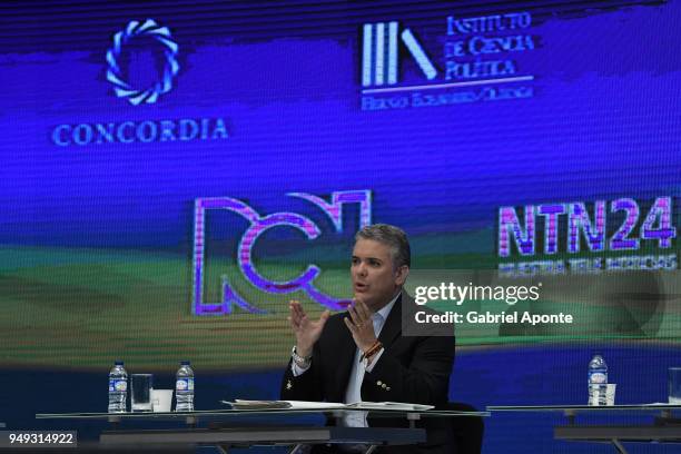 Ivan Duque presidential candidate speaks during the 2018 Americas Initiative Presidential Debate at Noticias RCN Studios on April 19, 2018 in Bogota,...