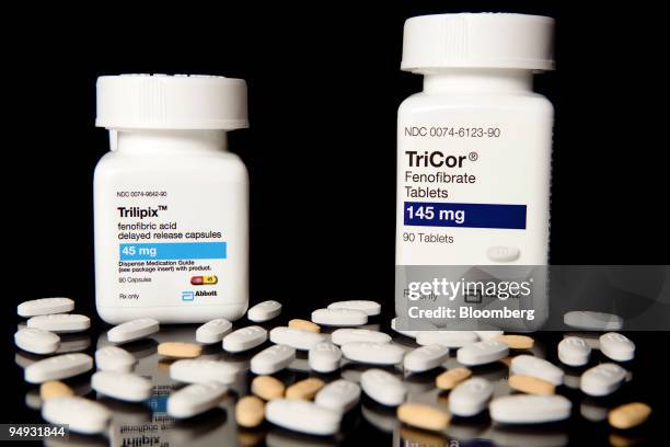 Abbott Laboratories' cholesterol drugs Trilipix and TriCor sit on display at New London Pharmacy in New York, U.S., on Monday, Sept. 28, 2009. Abbott...