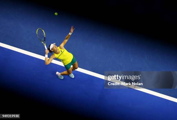 Samantha Stosur of Australia serves in her match against Lesley Kerkhove of the Netherlands during the World Group Play-Off Fed Cup tie between...