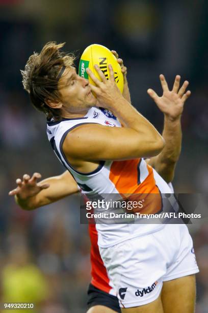 Ryan Griffen of the Giants marks the ball during the round five AFL match between the St Kilda Saints and the Greater Western Sydney Giants at Etihad...
