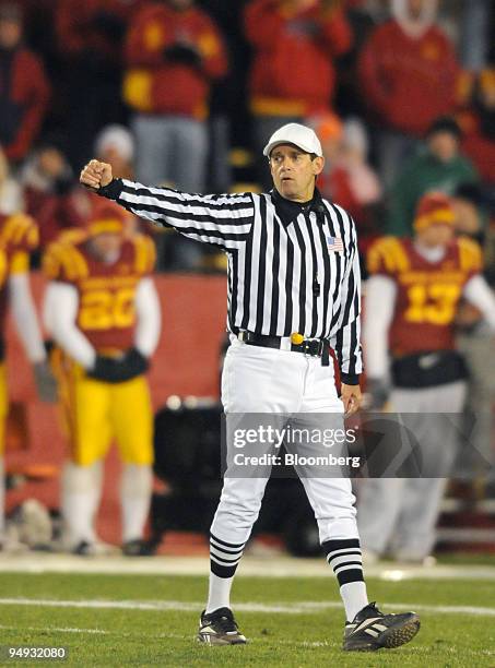 Referee Greg Burks, officiates a football game between Iowa State University and the University of Missouri in Ames, Iowa, U.S., on Saturday, Nov....