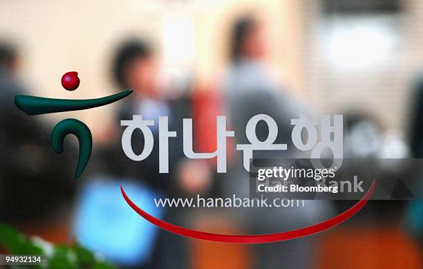 The logo of Hana Bank is displayed at the bank's headquarters in Seoul, South Korea, on Monday, Nov. 17, 2008. South Korea is boosting spending and...