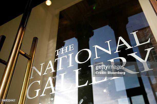 Signage is displayed at the entrance to the National Gallery in London, U.K., on Monday, Dec. 1, 2008. London's National Gallery and the National...