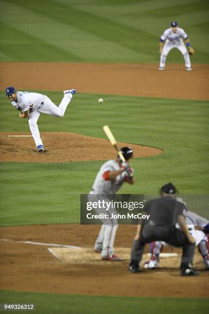 Clayton Kershaw of the Los Angeles Dodgers pitches to Moises Sierra of the Washington Nationals in the fifth inning at Dodger Stadium on April 20,...