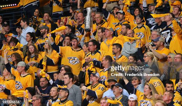 Fans of the Nashville Predators cheer during the third period of a 2-1 loss to the Colorado Avalanche in Game Five of the Western Conference First...