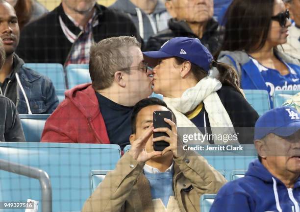 Patton Oswalt and wife Meredith Salenger attend The Los Angeles Dodgers Game at Dodger Stadium on April 20, 2018 in Los Angeles, California.