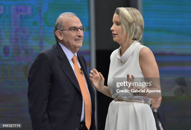 Humberto de la Calle presidential candidate talks with the host of the debate, Claudia Gurisatti, in a break during the 2018 Americas Initiative...