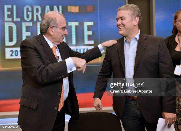 Humberto de la Calle and Ivan Duque, presidential candidates, talk before the 2018 Americas Initiative Presidential Debate at Noticias RCN Studios on...